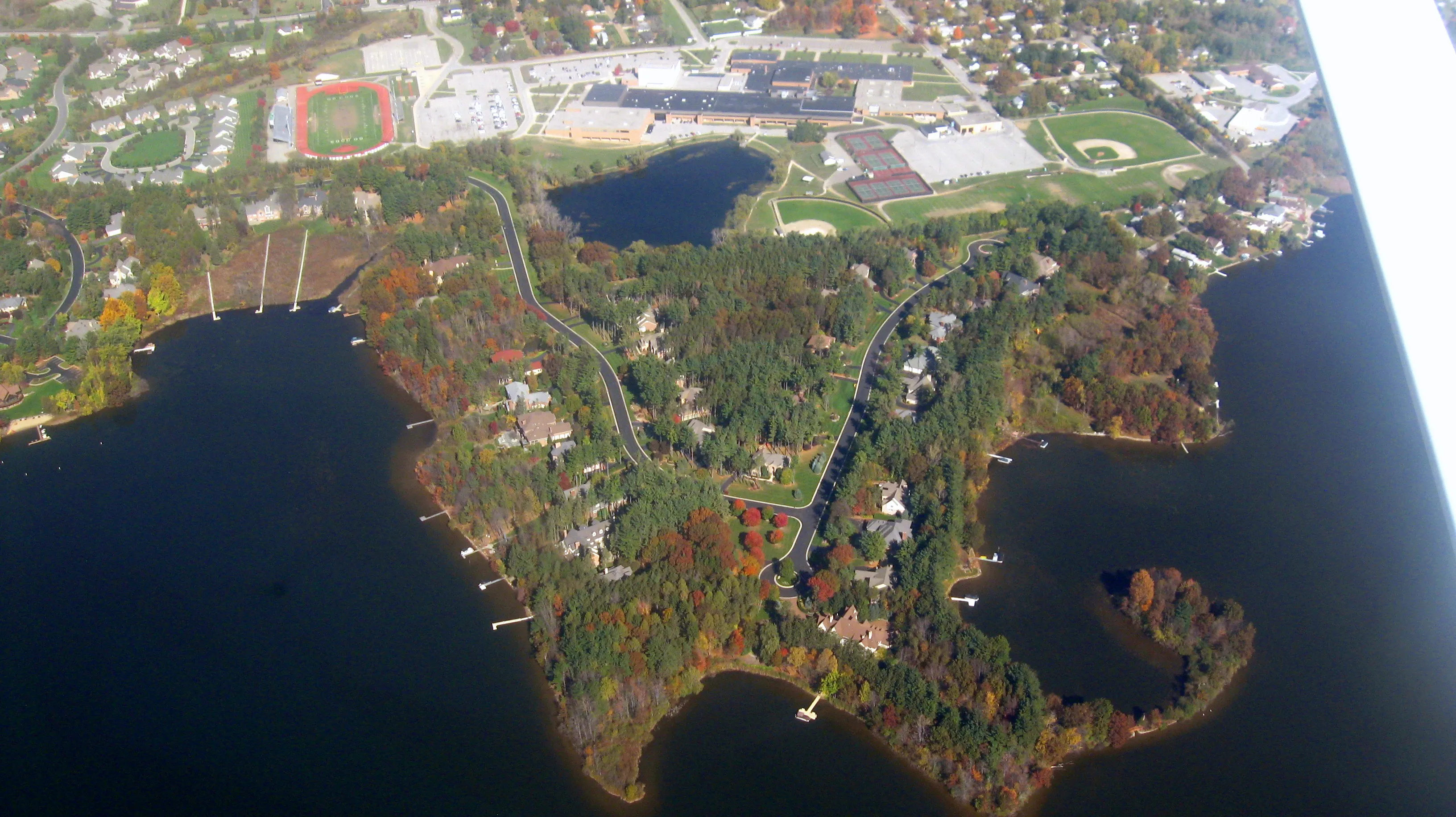 Aerial view of Brighton Lake and surrounding lake-country lots, Livingston County, Michigan